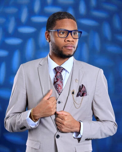 Kevin Keys III in a gray suit and tie.