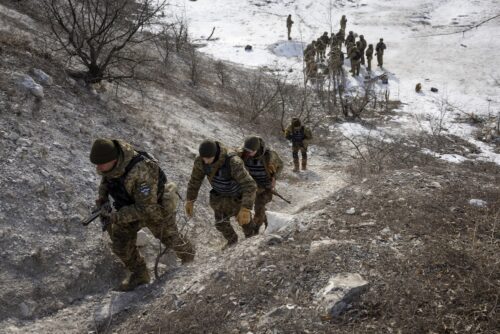 DONBAS, UKRAINE - FEBRUARY 24: Ukrainian replacement troops go through combat training on February 24, 2023 in the Donbas region of eastern Ukraine. According to the group's commander, the unit was badly depleted in recent weeks of vicious fighting against Russian Wagner mercenary forces, losing more than half its combat strength due to wounded and killed in action. He said that although his troops routinely decimate large groups of enemy forces, who attack his frontline positions in wave after wave of frontal assaults, the Russians still inflict significant damage. Fresh Ukrainian recruits are now being quickly trained, so the unit can return to the frontline at full strength. One year ago, Russia's military invaded Ukraine from three sides and launched airstrikes across the country. Since then, Moscow has withdrawn from north and central parts of Ukraine, focusing its assault on the eastern Donbas region, where it had supported a separatist movement since 2014.