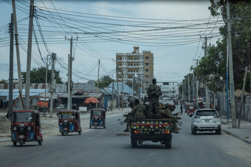MOGADISHU, SOMALIA - APRIL 21: Soldiers from the Somali National Army ride in a convoy as part of a security escort on April 21, 2025 in Mogadishu, Somalia. There are concerns of a jihadist resurgence in Somalia amid growing attacks by the militant group Al-Shabaab, which has been fighting the government for nearly two decades and controls swathes of the southern and central parts of the country. Last week, Al-Shabaab fighters raided the strategically important town of Adan Yabaal, north of Mogadishu, prompting a U.S.-backed airstrike on the militants. Besides the United States, Somali also has support from other international partners, including the African Union's new Stabilization and Support mission in Somalia, known as AUSSOM. But there is uncertainty about the future of AUSSOM's mandate after the U.S. recently objected to a United Nations proposal for funding the mission.