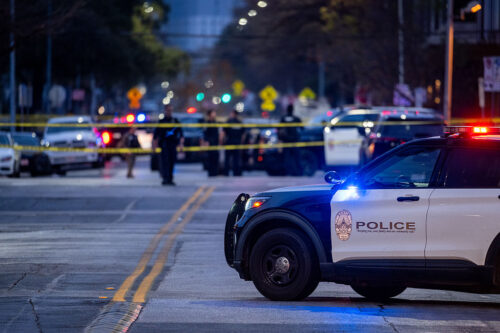 AUSTIN, TEXAS - MARCH 01: law enforcement patrol an intersection near Buford's bar in downtown on March 01, 2026 in Austin, Texas. Three people are dead and 14 others hospitalized following a mass shooting early Sunday morning. (Photo by Brandon Bell/Getty Images)