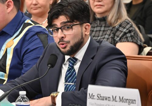 Shalin Jyotishi sits at a table testifying