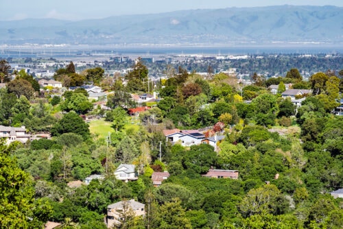Aerial view of Redwood City, CA, with the San Francisco Bay in the background