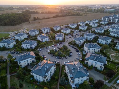 An aerial view of a suburban development of multi-family housing in the U.S.