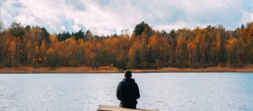 Lonely man on bridge
