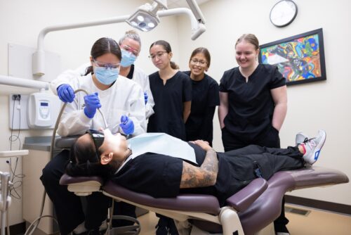 Group of students learn dental hygiene