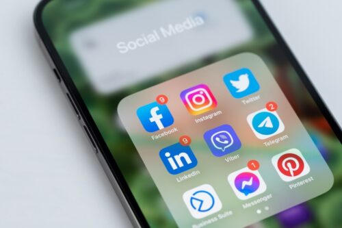 iPhone with social media apps
