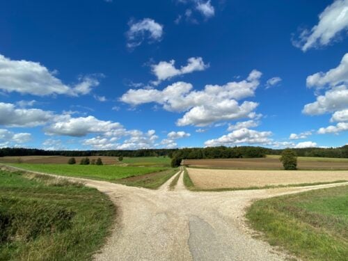 a wide open rural landscape with blue sky